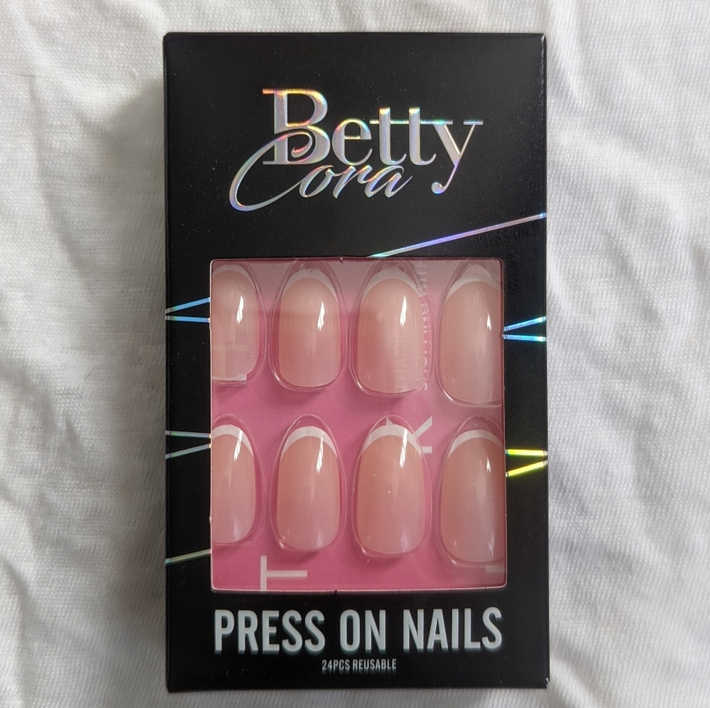 Bettycora medium length round oval press on nails in pink french tip pattern